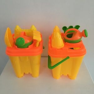 Two child’s pails with accessories